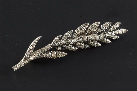 A Victorian gold, silver and diamond foliate spray brooch, 3in.